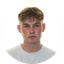 Portrait of young man with light brown hair wearing white shirt and silver necklace against white background